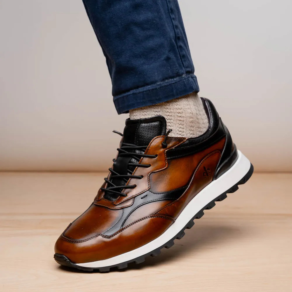 Sure, I understand that you want to optimize the title of the e-commerce product. How about this for the revised title: Hand-Finished Cognac and Black BRAVO Trainer - 65-355-BRN