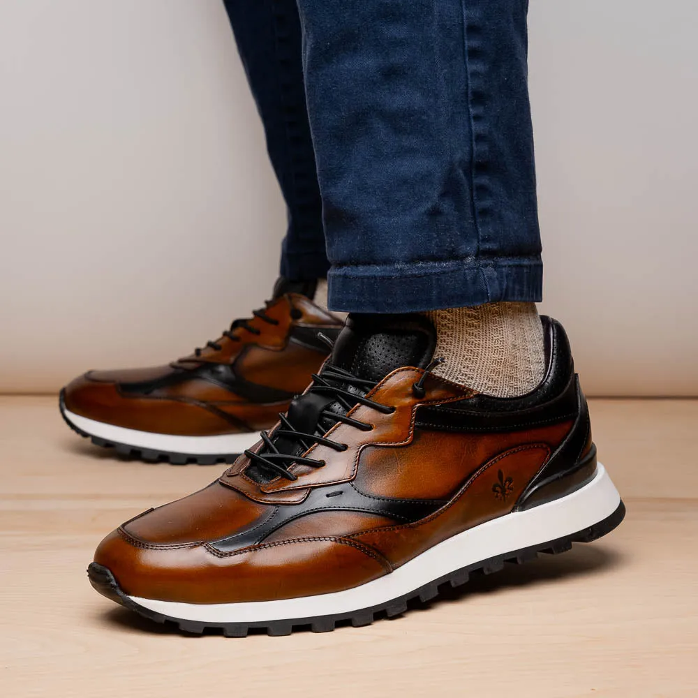 Sure, I understand that you want to optimize the title of the e-commerce product. How about this for the revised title: Hand-Finished Cognac and Black BRAVO Trainer - 65-355-BRN