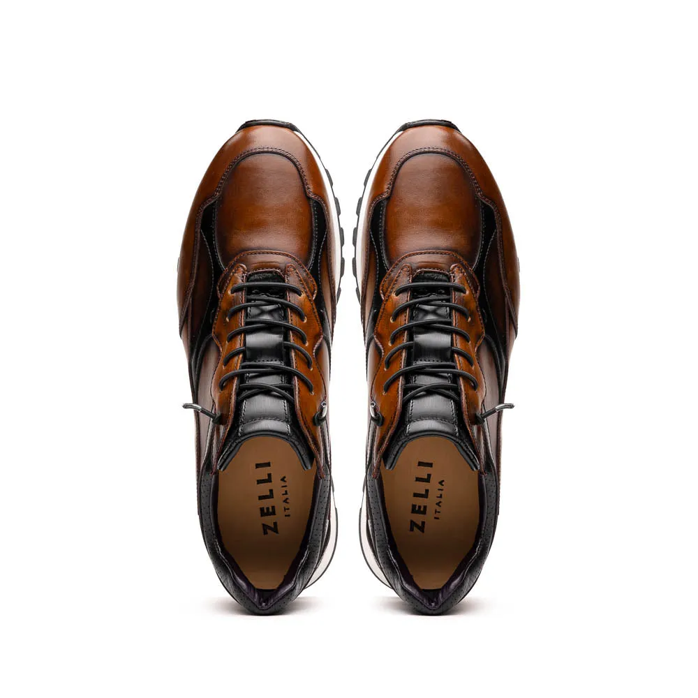 Sure, I understand that you want to optimize the title of the e-commerce product. How about this for the revised title: Hand-Finished Cognac and Black BRAVO Trainer - 65-355-BRN